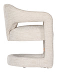 Contemporary upholstered armchair in a soft beige fabric, featuring a sculptural curved frame and plush seating for a modern, sophisticated look.