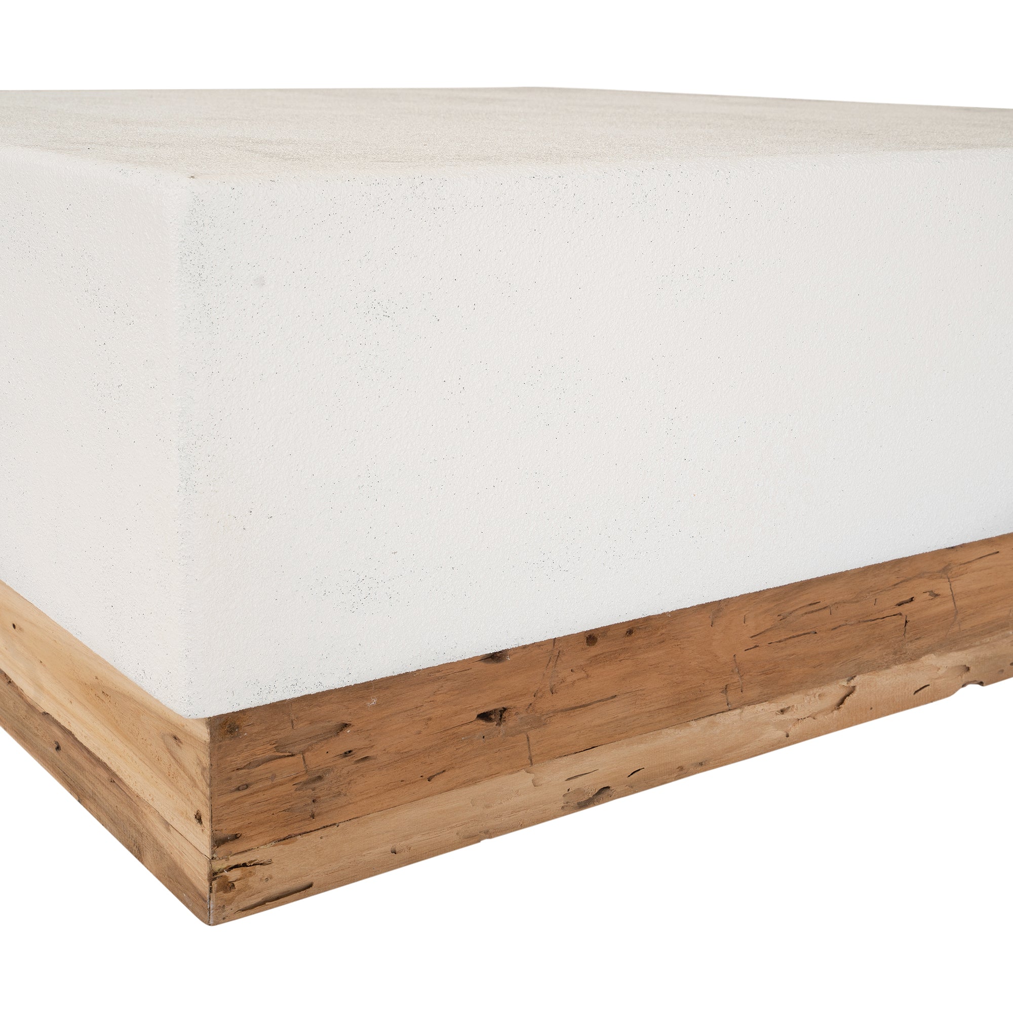 A contemporary white coffee table with a rustic wooden base, featuring a minimalist block design. This versatile piece blends modern aesthetics with organic textures, perfect for living spaces that embrace natural materials and clean lines