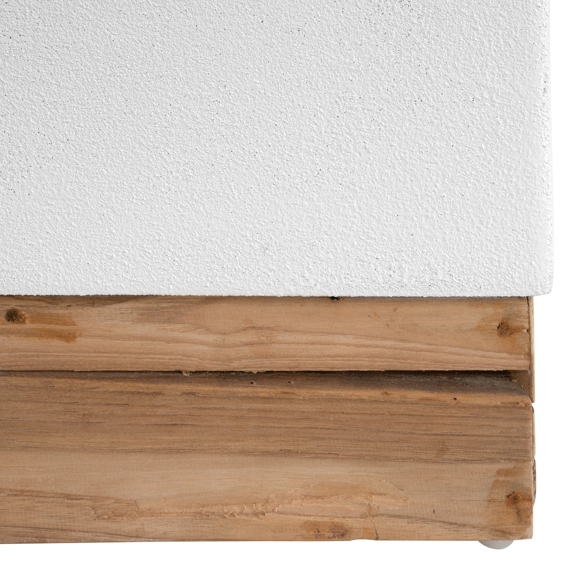 A contemporary white coffee table with a rustic wooden base, featuring a minimalist block design. This versatile piece blends modern aesthetics with organic textures, perfect for living spaces that embrace natural materials and clean lines