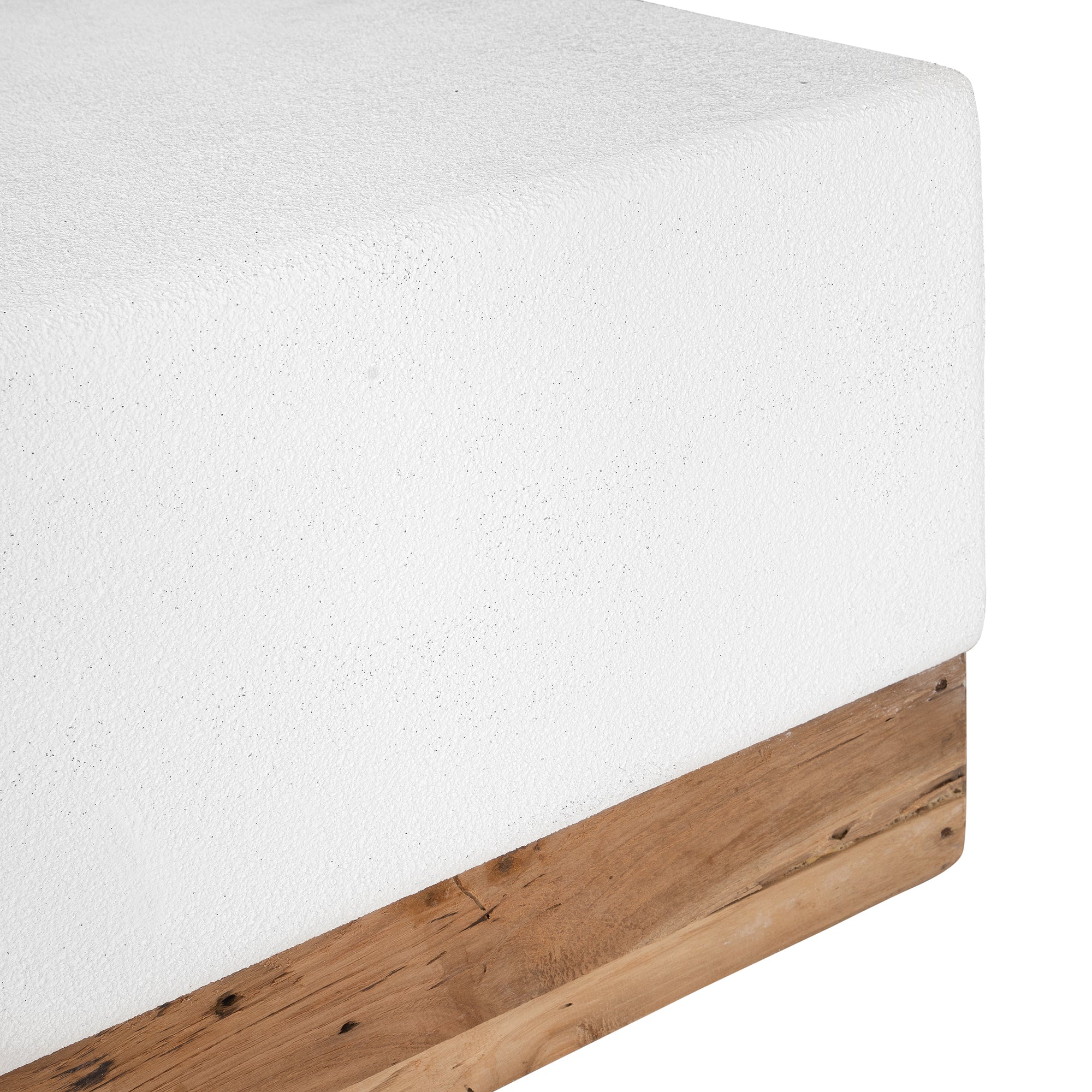 A contemporary white coffee table with a rustic wooden base, featuring a minimalist block design. This versatile piece blends modern aesthetics with organic textures, perfect for living spaces that embrace natural materials and clean lines