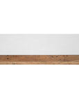A contemporary white coffee table with a rustic wooden base, featuring a minimalist block design. This versatile piece blends modern aesthetics with organic textures, perfect for living spaces that embrace natural materials and clean lines