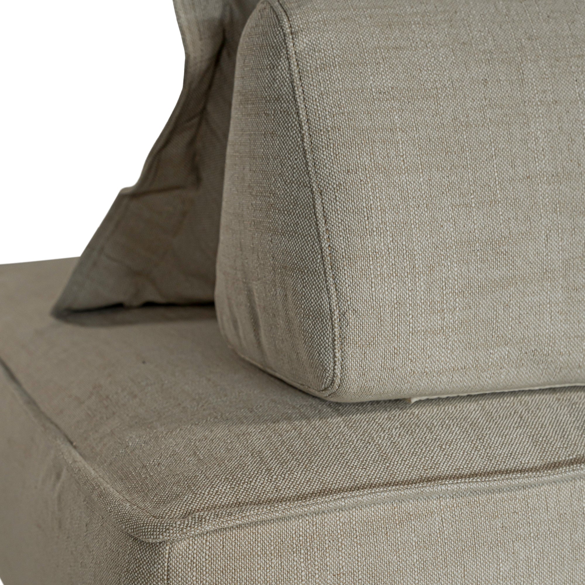 A versatile modular lounge chair in moss upholstery, designed for ultimate comfort with a deep seat and plush back cushion. Perfect for modern, relaxed interiors