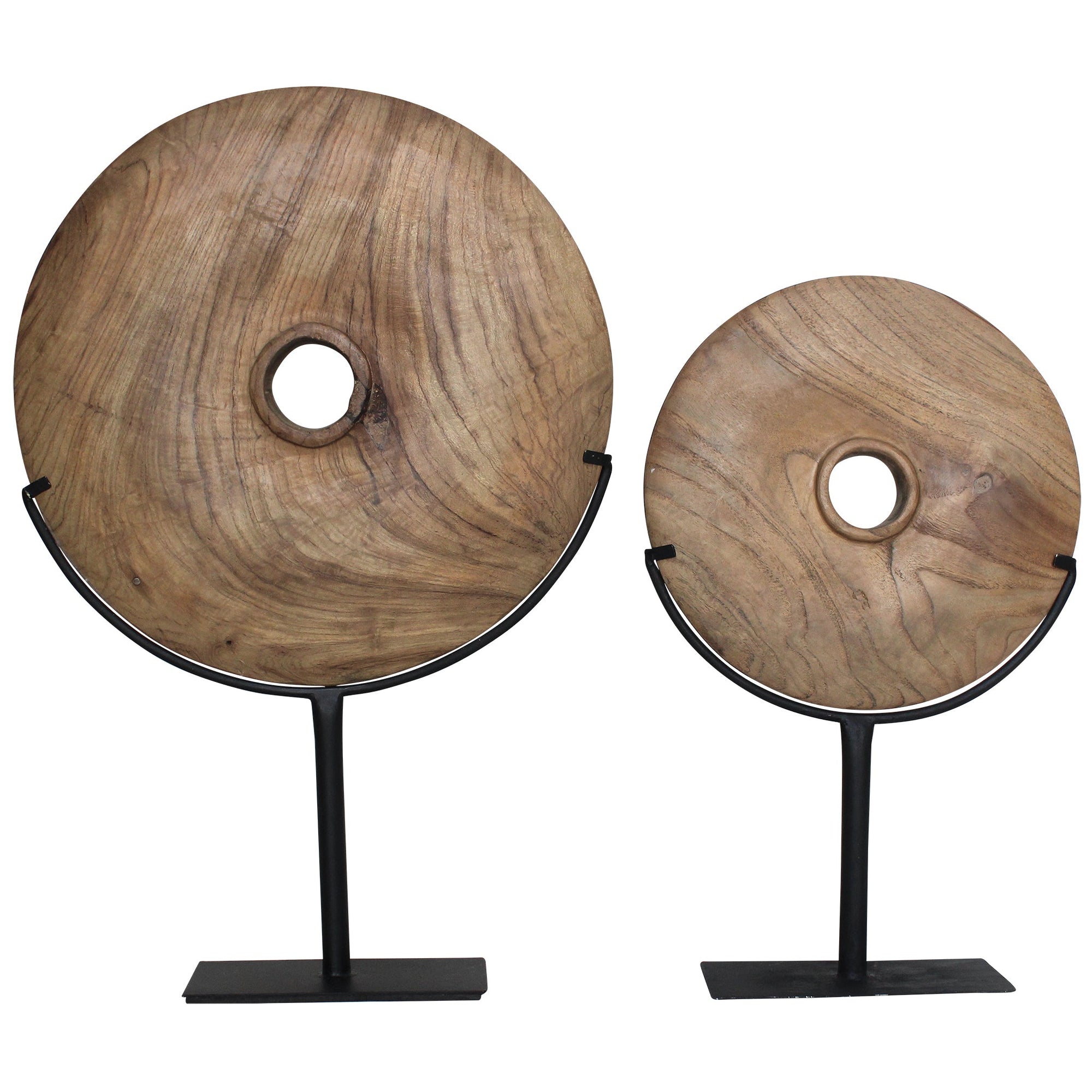 Natural carved teak disc sculpture with stand in modern minimalist design, perfect for adding bold decorative accents to any interior space