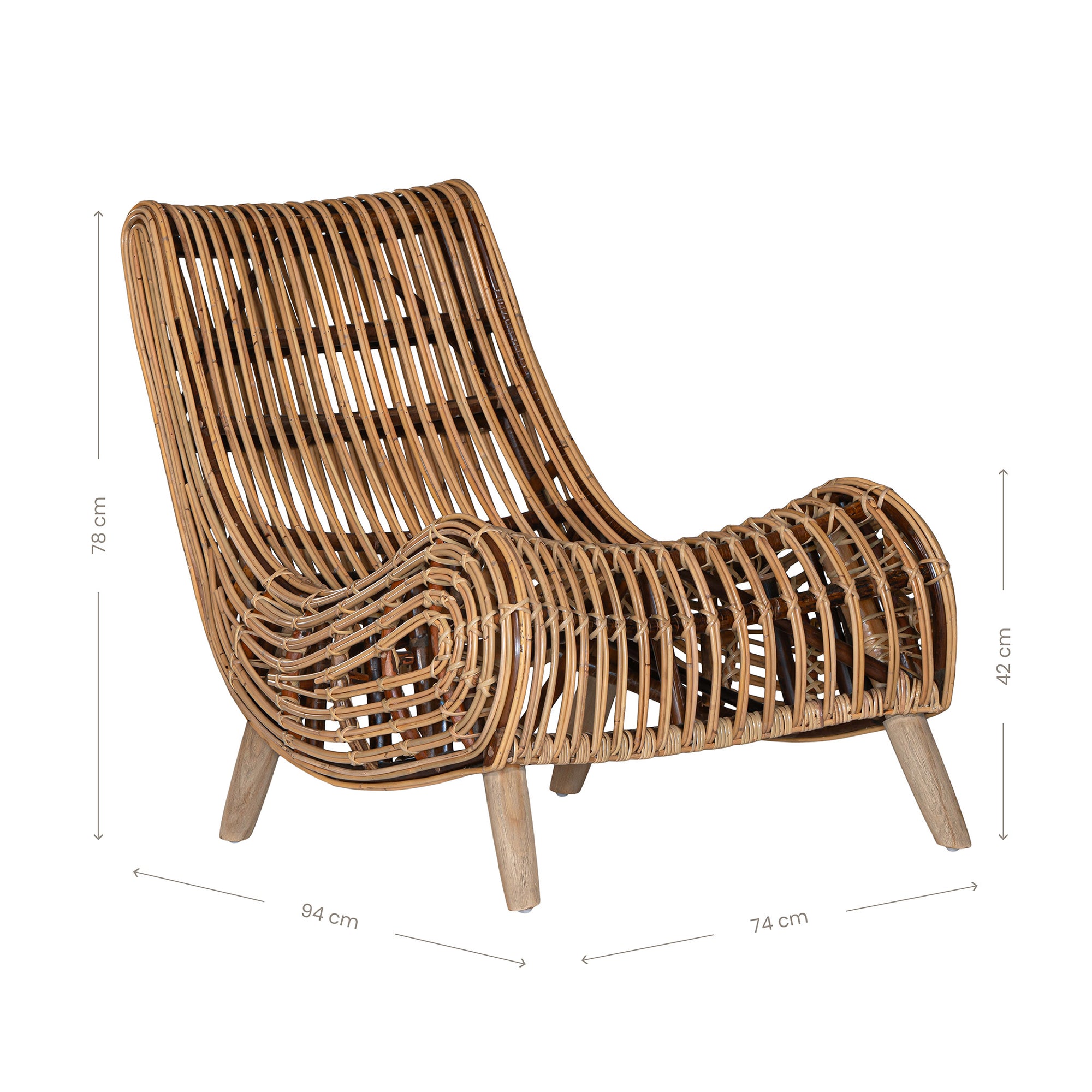 A sculptural natural rattan lounge chair with a curved, low-profile silhouette and sleek wooden legs. The woven design adds texture, while the deep seat and ergonomic shape offer comfort and relaxation