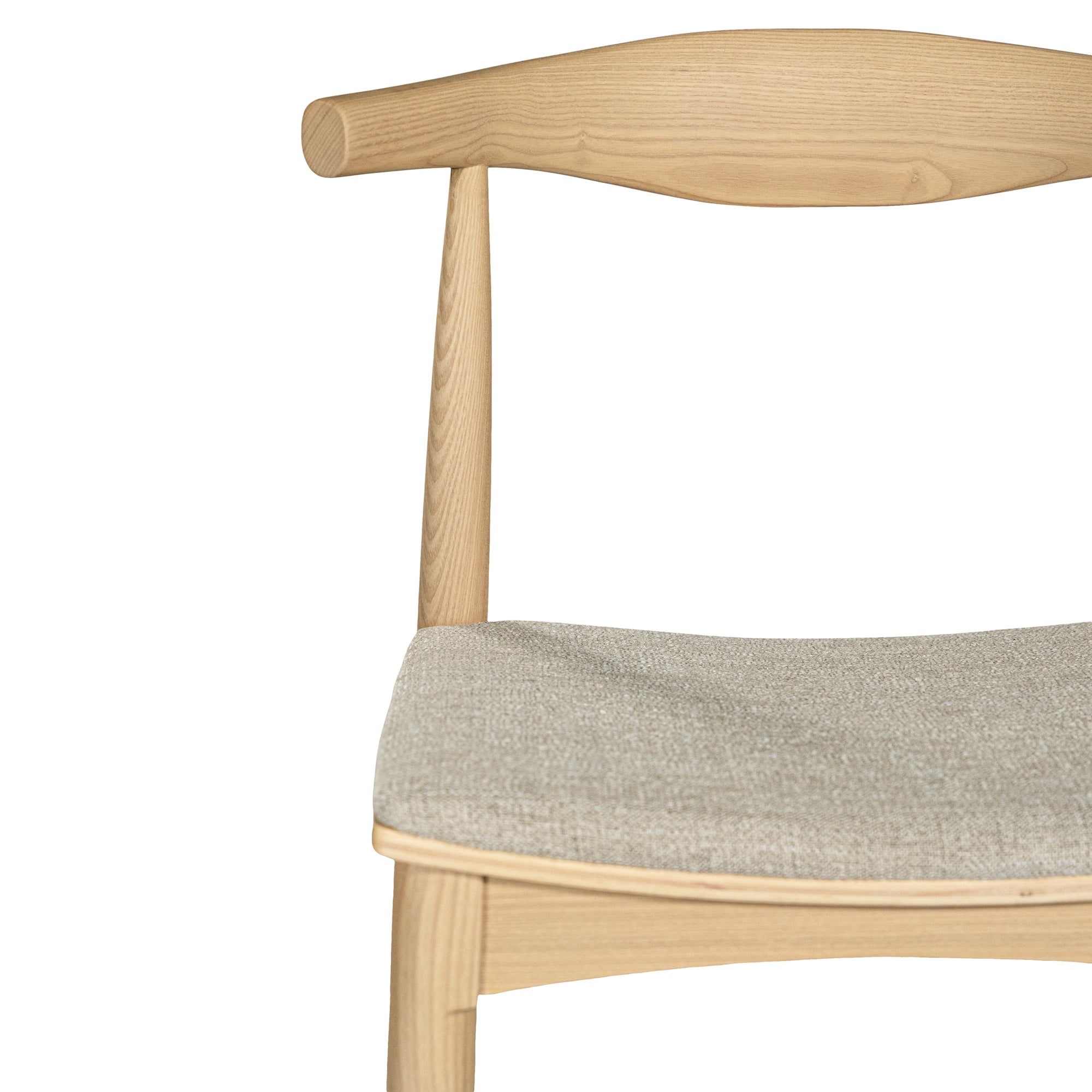 Kulala Living natural wood dining chair featuring a sculpted backrest and a lightly upholstered seat in a neutral fabric. A blend of minimalist design and organic materials, perfect for modern dining spaces.