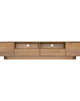 Natural oak TV unit featuring a sleek curved design with ample storage, including cabinets, a drawer, and an open shelf for media organisation