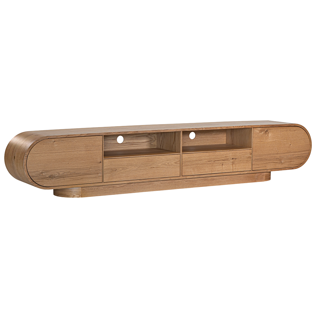 Natural oak TV unit featuring a sleek curved design with ample storage, including cabinets, a drawer, and an open shelf for media organisation