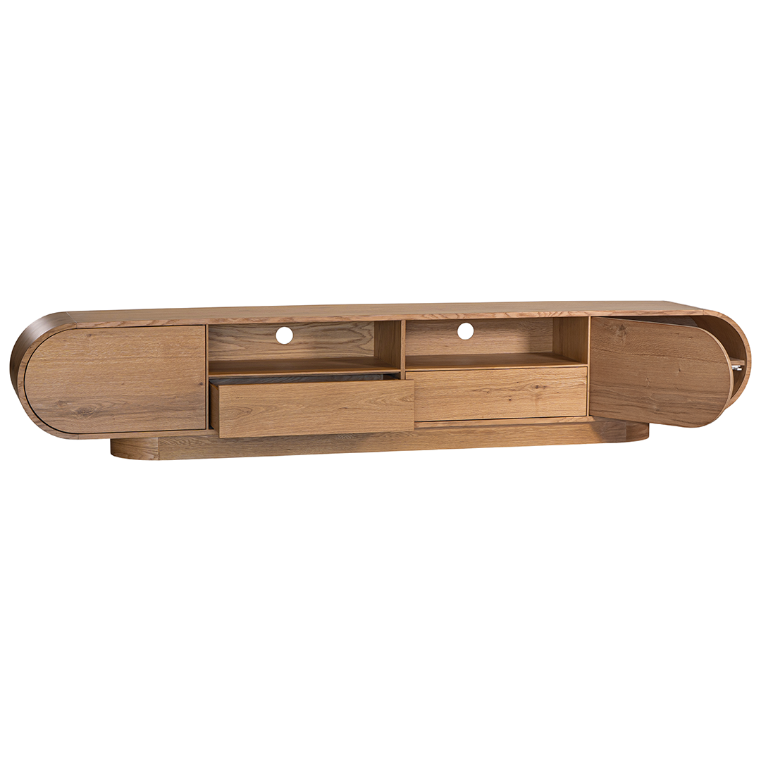 Natural oak TV unit featuring a sleek curved design with ample storage, including cabinets, a drawer, and an open shelf for media organisation