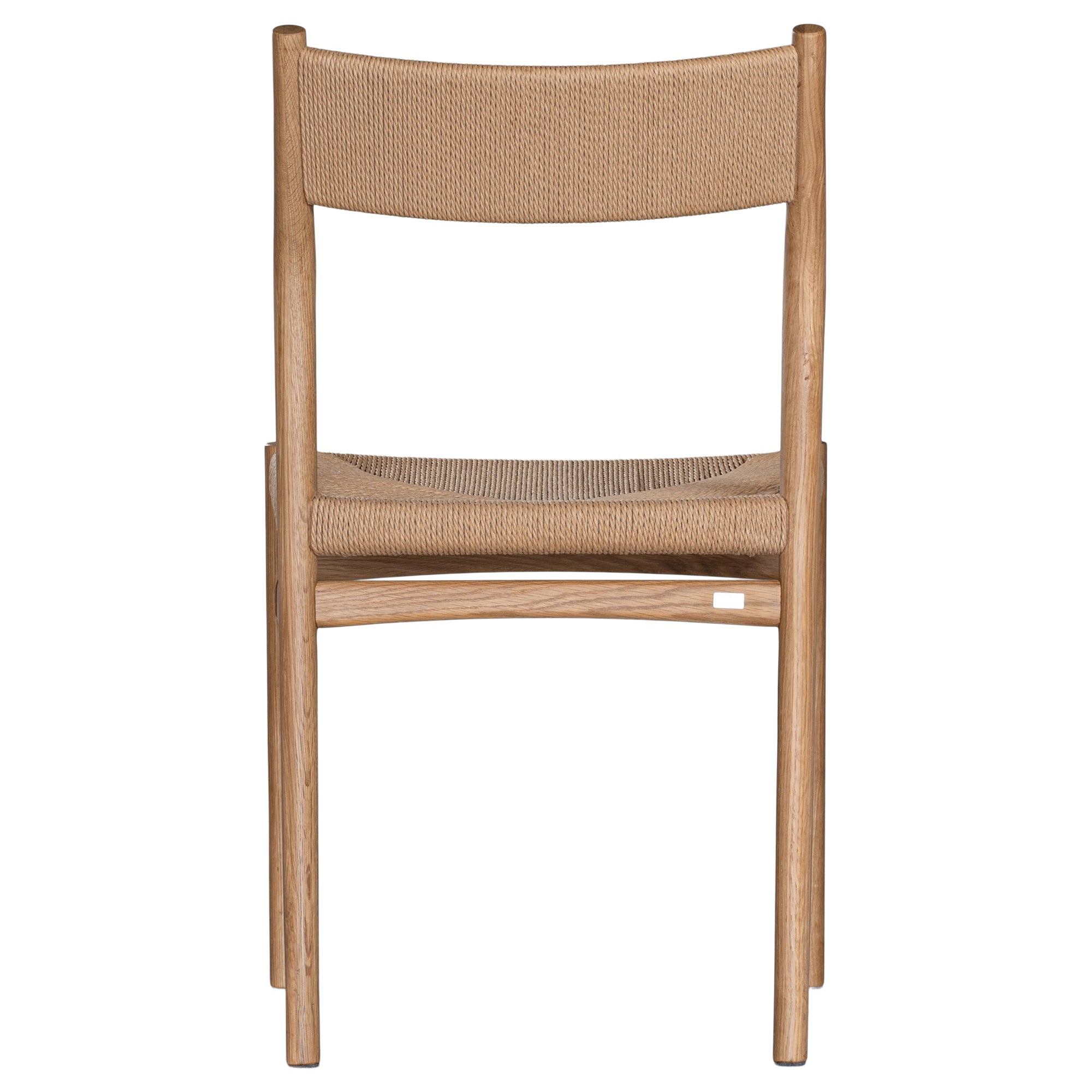 Elegant dining chair crafted from natural timber with a woven paper cord seat and backrest, showcasing a minimalist Scandinavian-inspired design