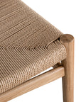 Elegant dining chair crafted from natural timber with a woven paper cord seat and backrest, showcasing a minimalist Scandinavian-inspired design