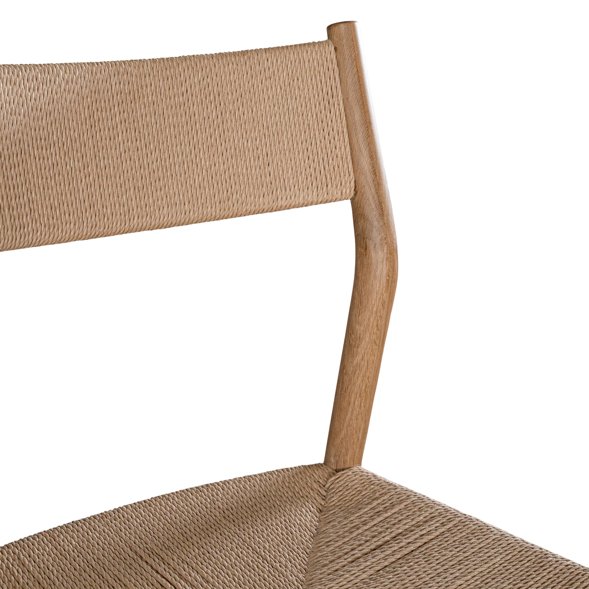 Elegant dining chair crafted from natural timber with a woven paper cord seat and backrest, showcasing a minimalist Scandinavian-inspired design