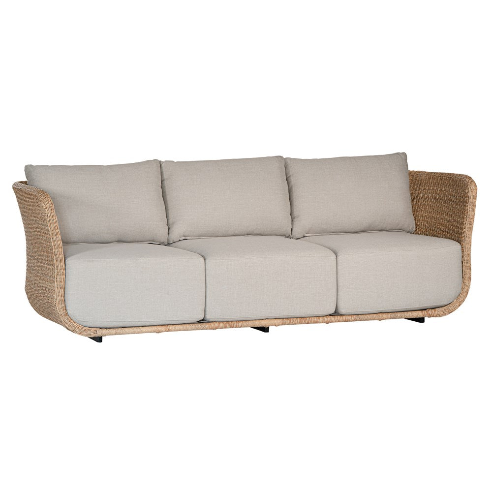 Natural rattan three seater with plush barley cushions, offering a blend of comfort and contemporary coastal style