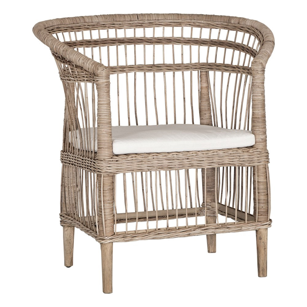 A beautifully crafted natural rattan armchair with an open-weave design and a white cushioned seat, perfect for adding a relaxed coastal touch to any space.