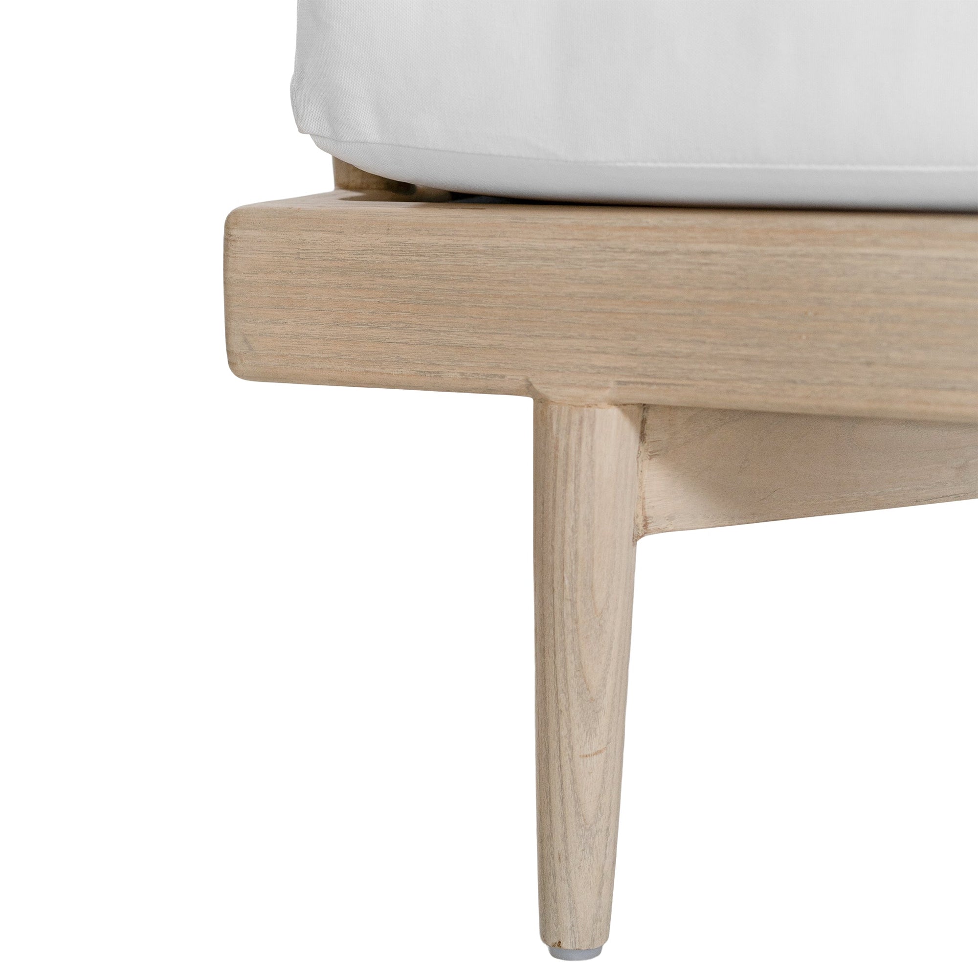 Natural rope lounge chair with white cushions, featuring a light timber frame and modern coastal aesthetic.