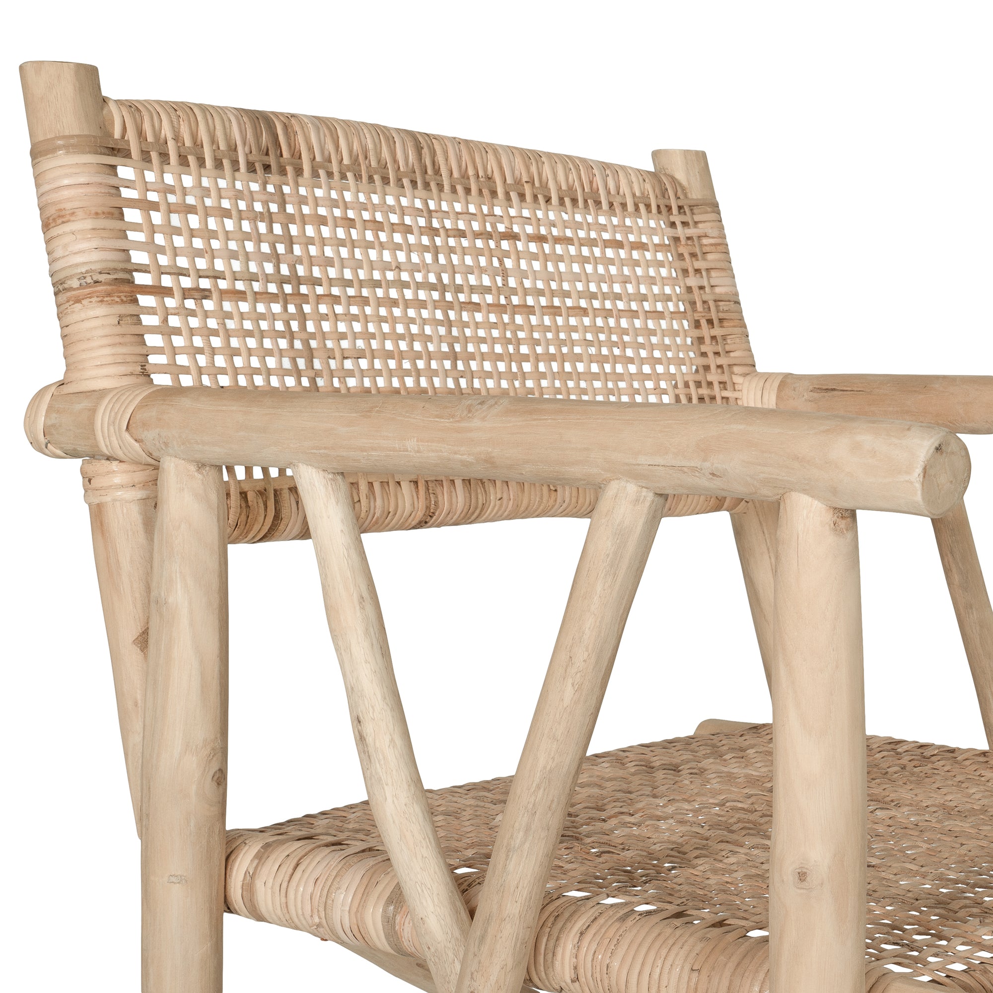 Natural rattan armchair with rustic branch frame, perfect for adding a touch of organic texture to any dining space