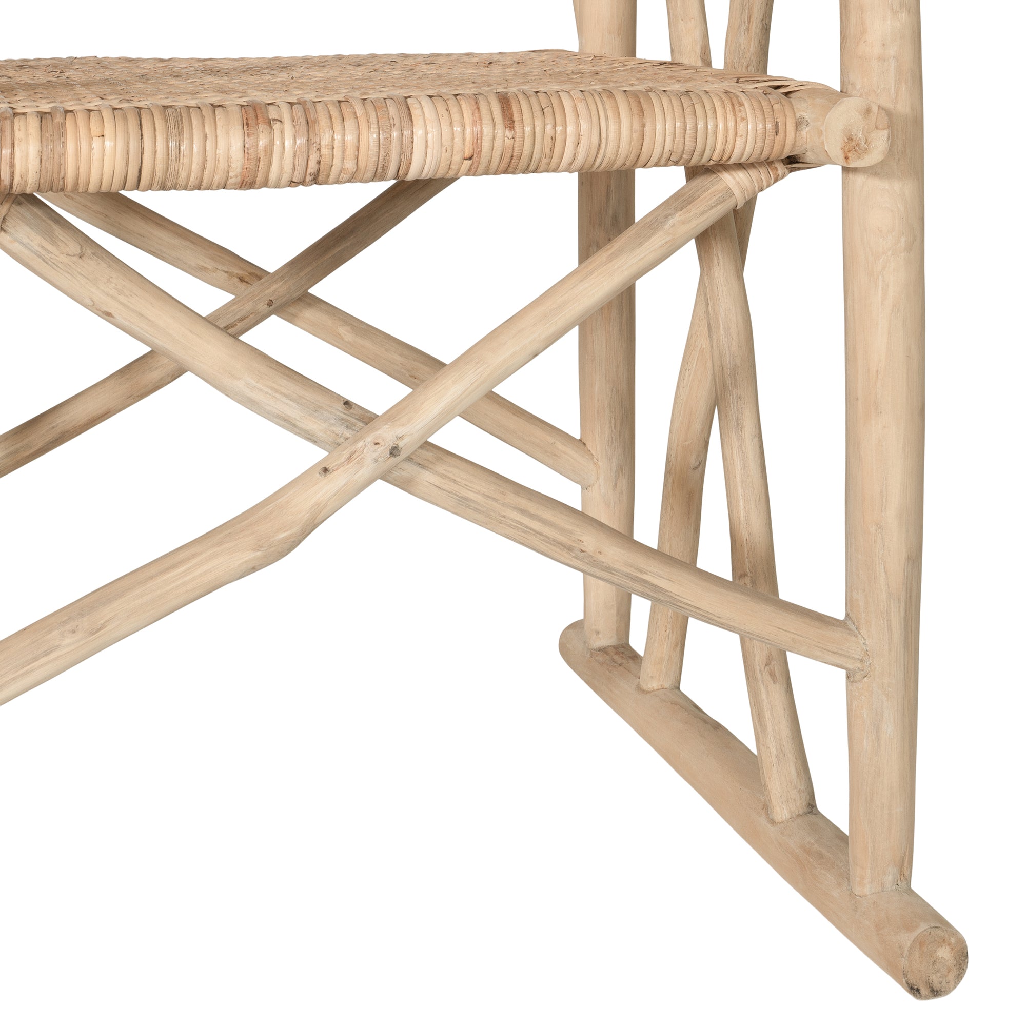 Natural rattan armchair with rustic branch frame, perfect for adding a touch of organic texture to any dining space