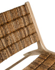 Natural banana leaf lounge chair with a sturdy wooden teak frame, perfect for relaxed indoor or outdoor living spaces