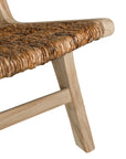 Natural banana leaf lounge chair with a sturdy wooden teak frame, perfect for relaxed indoor or outdoor living spaces