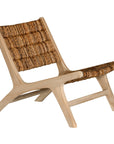 Natural banana leaf lounge chair with a sturdy wooden teak frame, perfect for relaxed indoor or outdoor living spaces