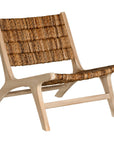 Natural banana leaf lounge chair with a sturdy wooden teak frame, perfect for relaxed indoor or outdoor living spaces
