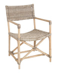 Natural wicker armchair with armrests and a sturdy cross-frame base, showcasing a contemporary design suitable for indoor or outdoor dining spaces.
