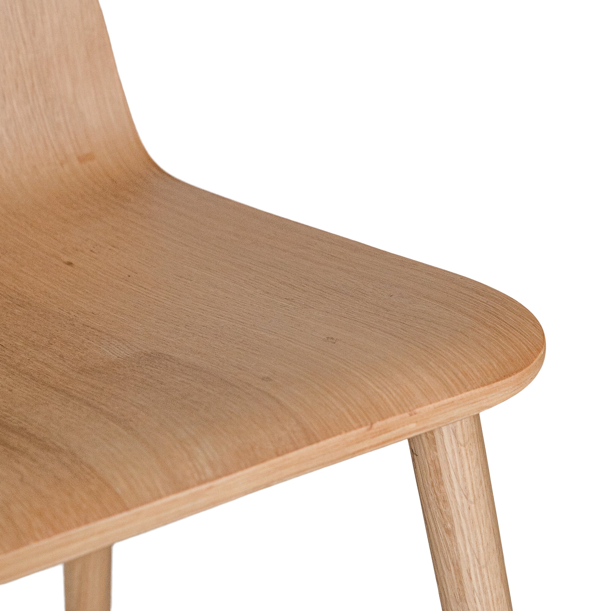 The Kulala Living natural wood dining chair features a sleek, curved seat with a natural wood grain finish. Its minimalist design and sturdy legs make it a stylish and versatile addition to any modern dining space