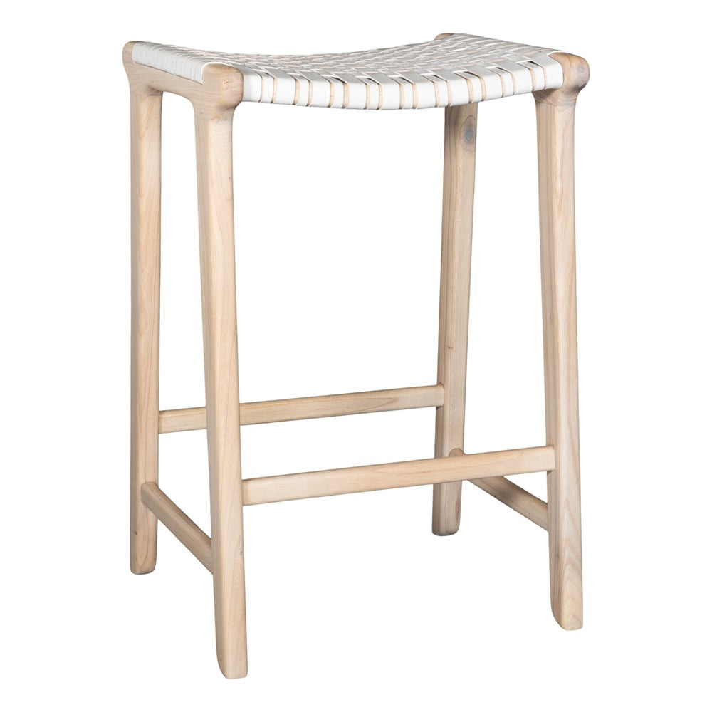 A handcrafted natural wood bar stool featuring a woven white leather seat, designed for a relaxed and stylish coastal-inspired space.