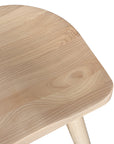 Natural wooden bar stool with sleek modern design and contoured seat, perfect for contemporary kitchen or bar settings
