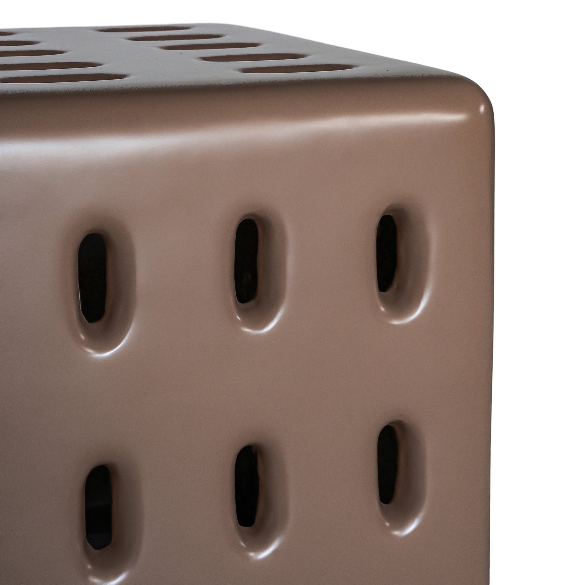 Concrete chocolate side table with modern cut-out design
