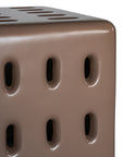 Concrete chocolate side table with modern cut-out design