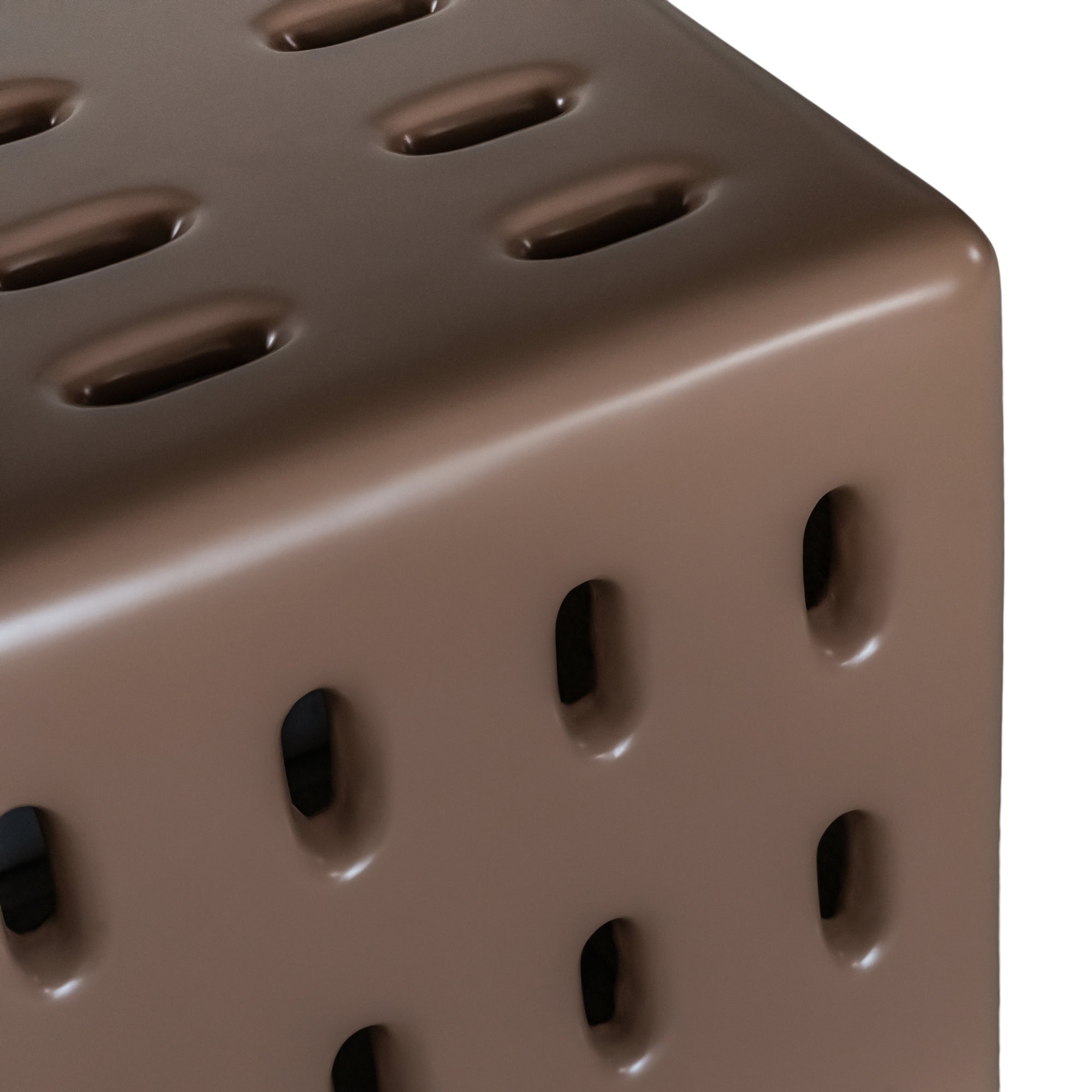 Concrete chocolate side table with modern cut-out design