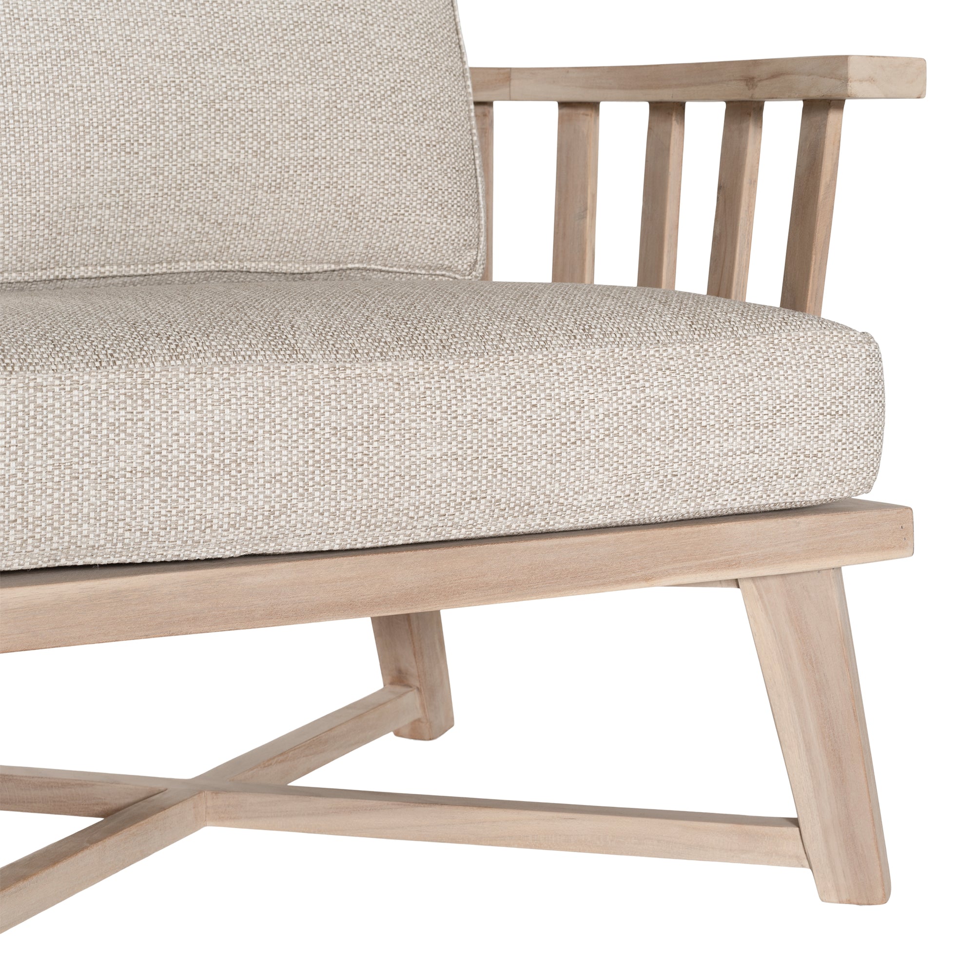 Nikki Beach Occasional Chair with natural timber frame and neutral upholstered cushions, showcasing a modern coastal design