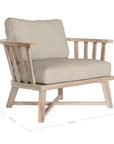 Nikki Beach Occasional Chair with natural timber frame and neutral upholstered cushions, showcasing a modern coastal design