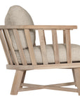 Nikki Beach Occasional Chair with natural timber frame and neutral upholstered cushions, showcasing a modern coastal design