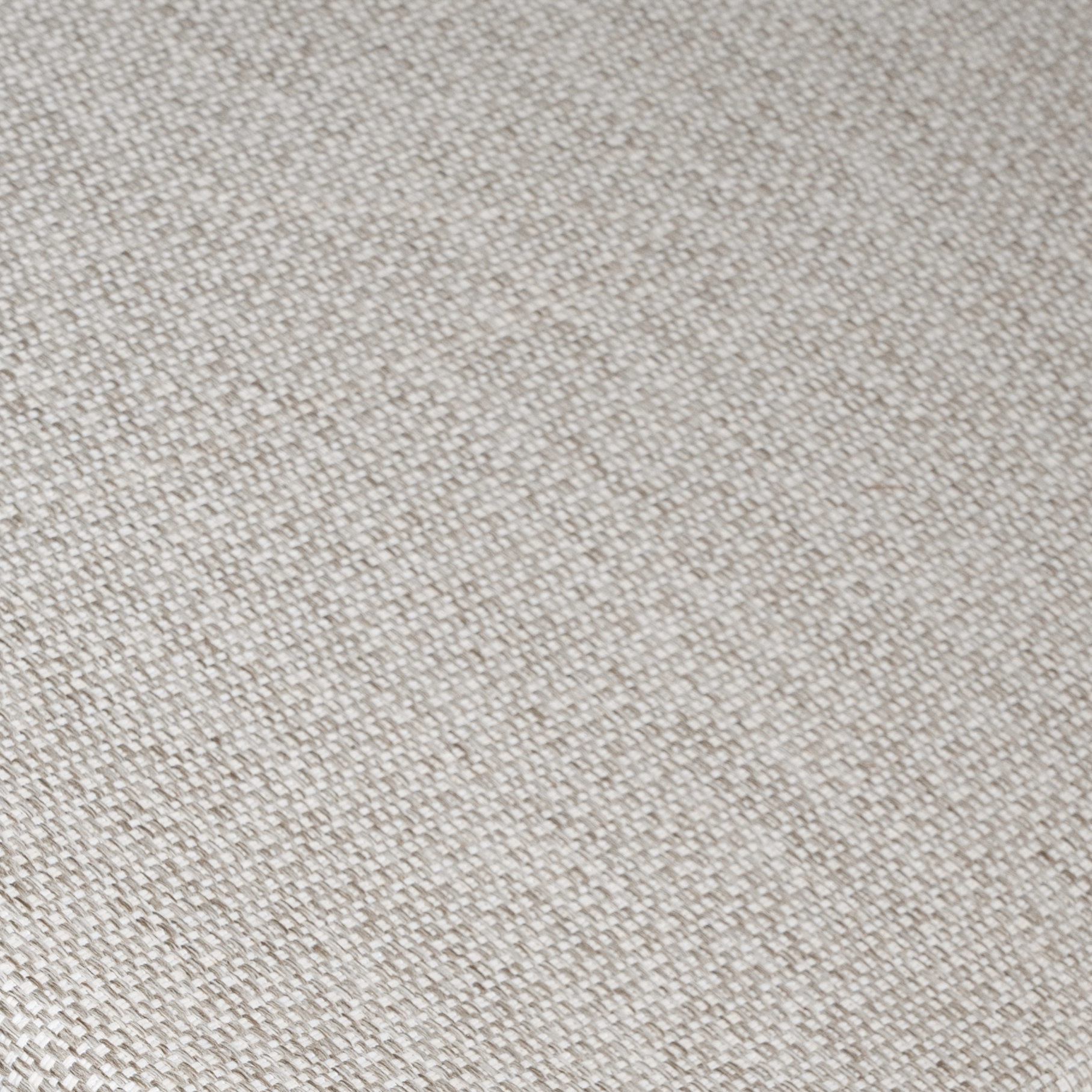  Close-up of ivory boucle fabric texture, showcasing the soft, woven upholstery with a subtle textured finish