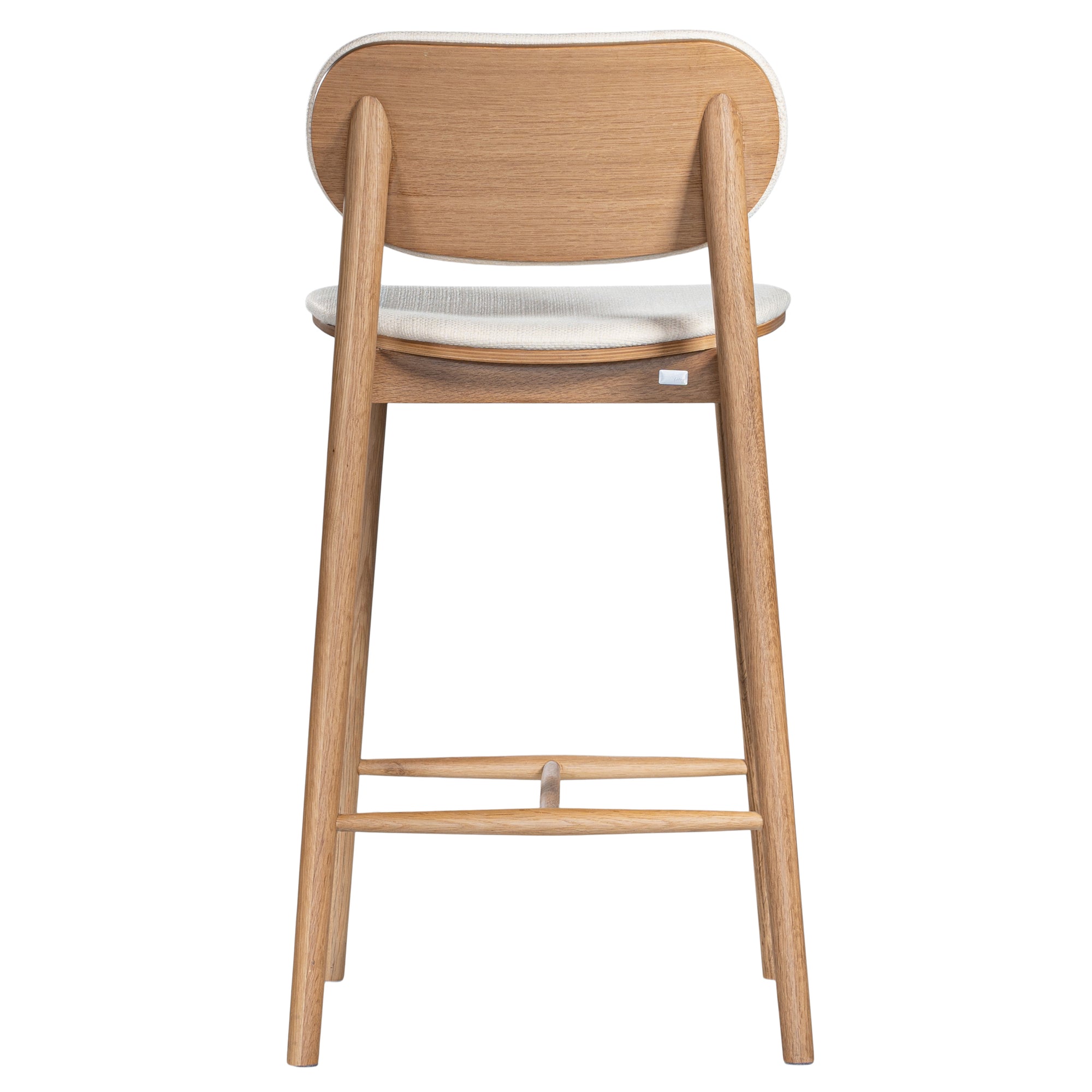 A contemporary bar stool featuring a natural oak frame with a curved white upholstered seat and backrest, designed for modern kitchens and dining spaces