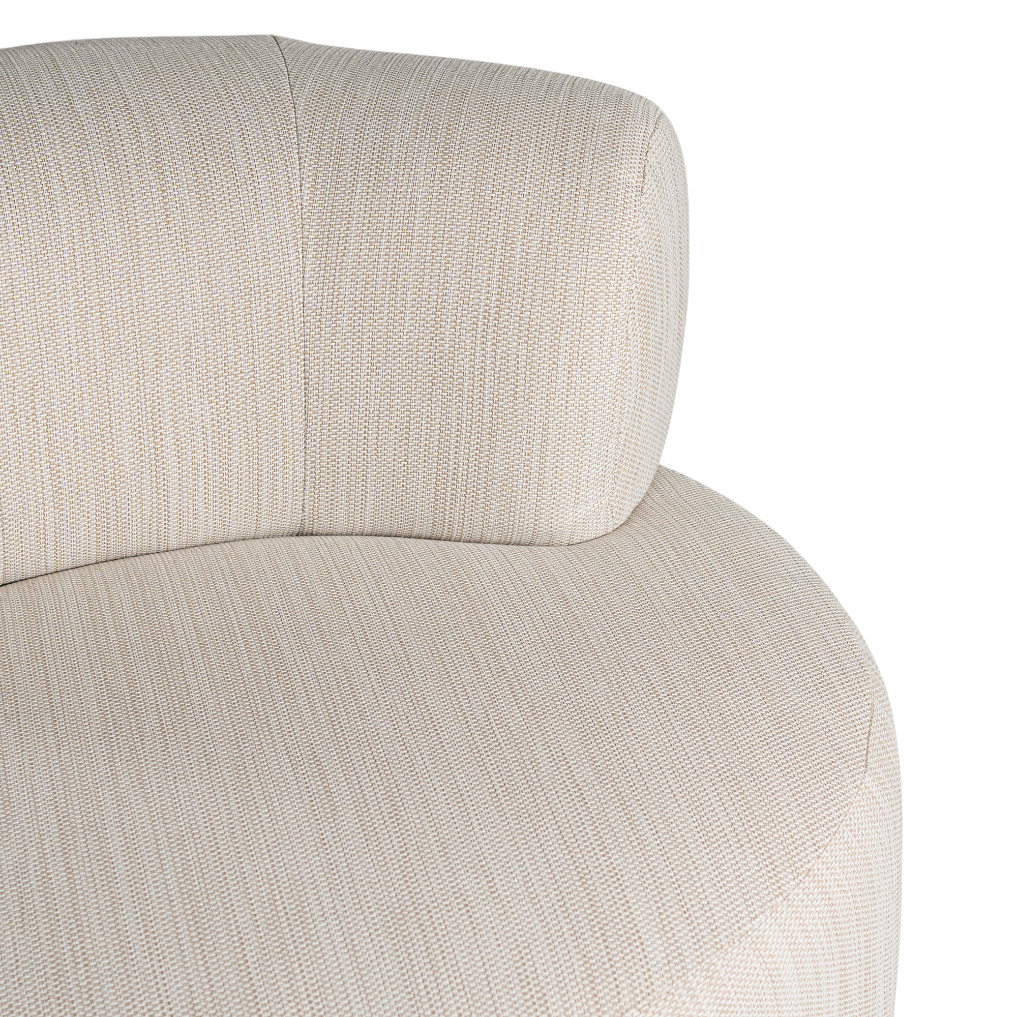 A contemporary pebble upholstered lounge chair with a low-profile design and curved backrest. This modern, armless seating piece features a smooth, rounded silhouette, making it a stylish and comfortable addition to any living space
