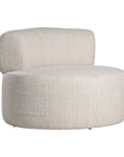 A contemporary pebble upholstered lounge chair with a low-profile design and curved backrest. This modern, armless seating piece features a smooth, rounded silhouette, making it a stylish and comfortable addition to any living space