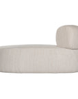 A contemporary pebble upholstered lounge chair with a low-profile design and curved backrest. This modern, armless seating piece features a smooth, rounded silhouette, making it a stylish and comfortable addition to any living space