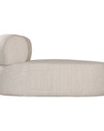 A contemporary pebble upholstered lounge chair with a low-profile design and curved backrest. This modern, armless seating piece features a smooth, rounded silhouette, making it a stylish and comfortable addition to any living space