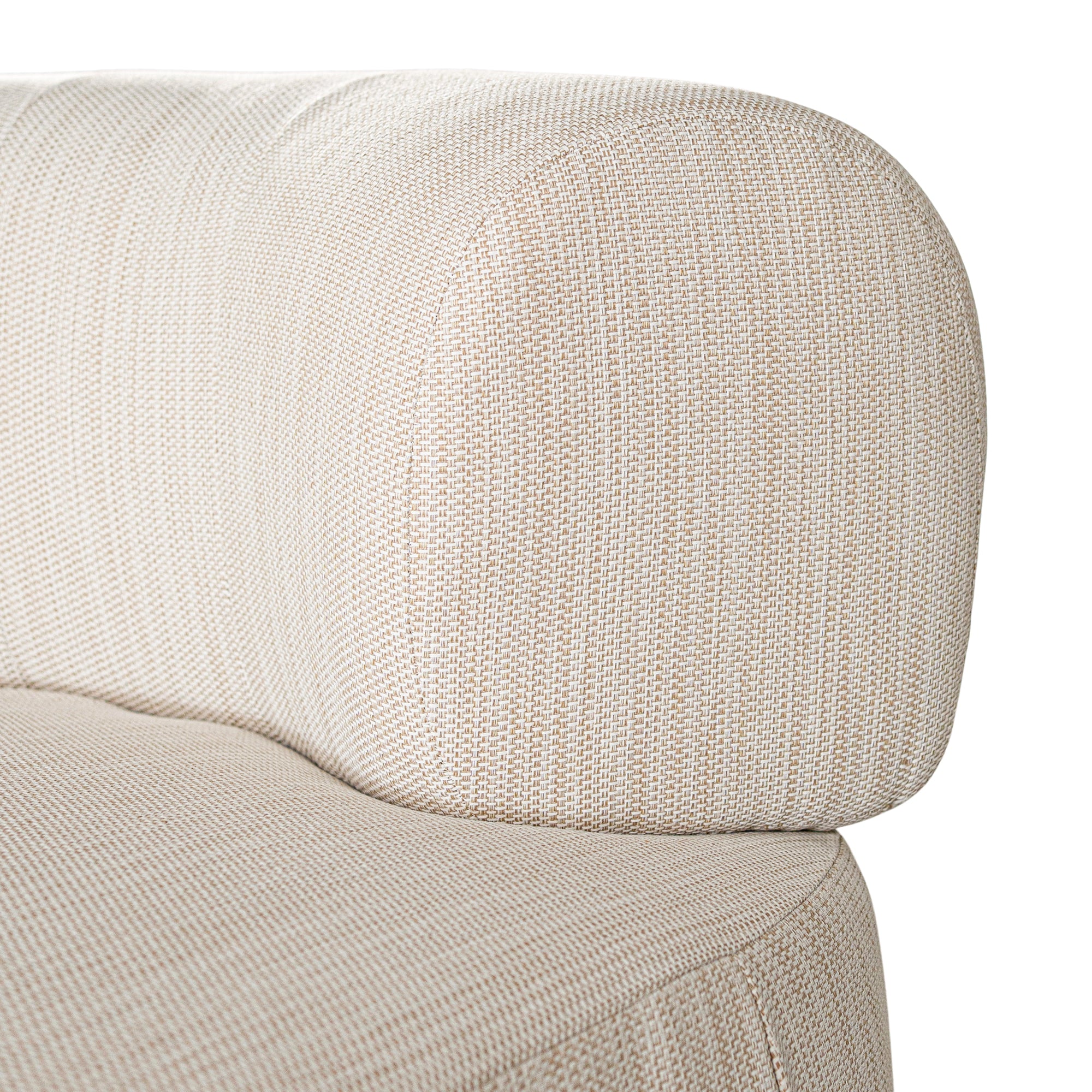 A contemporary pebble upholstered lounge chair with a low-profile design and curved backrest. This modern, armless seating piece features a smooth, rounded silhouette, making it a stylish and comfortable addition to any living space