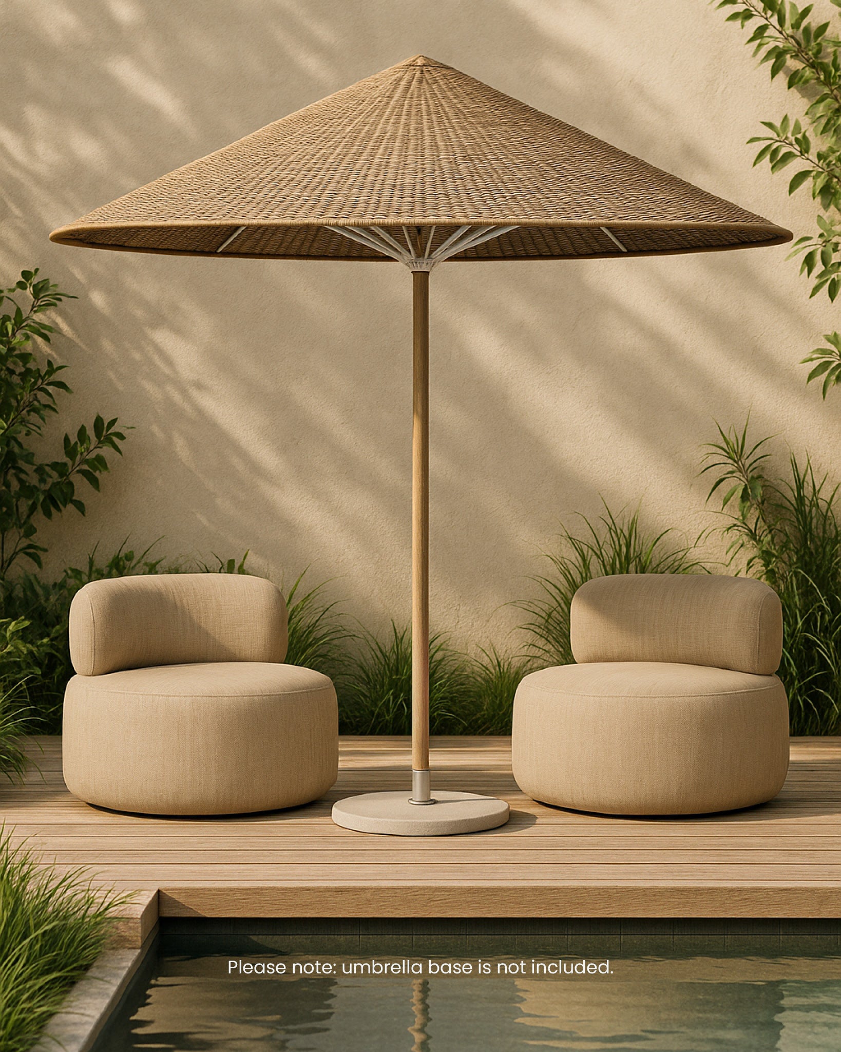 Round Chairs in sand fabric styled poolside beneath the Rafiki Sunhat Umbrella with a woven canopy and timber pole, surrounded by natural greenery in a relaxed outdoor setting