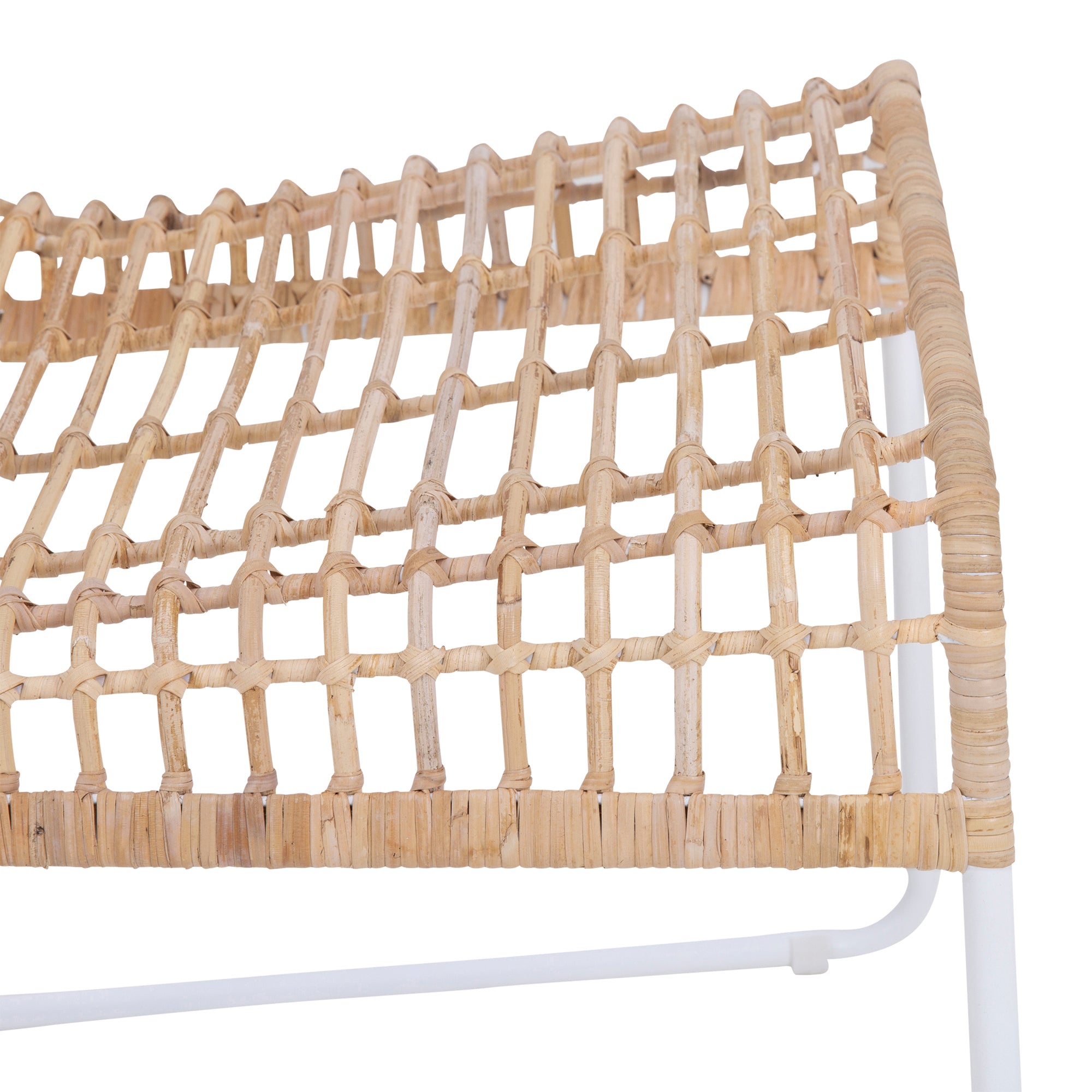 A handwoven rattan dining chair with a white metal frame, featuring an airy, open-weave design. The natural rattan seat and backrest bring an organic touch to contemporary and coastal interiors