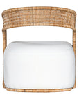 A rattan armchair featuring a curved backrest and a plush white upholstered seat. This coastal-inspired piece combines natural textures with modern comfort, ideal for relaxed living spaces