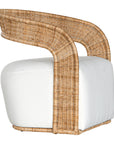 A rattan armchair featuring a curved backrest and a plush white upholstered seat. This coastal-inspired piece combines natural textures with modern comfort, ideal for relaxed living spaces