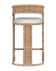 A natural rattan bar stool with a curved backrest and a white upholstered cushion. The woven texture and sturdy frame bring a relaxed yet sophisticated coastal-inspired aesthetic to any bar or kitchen counter