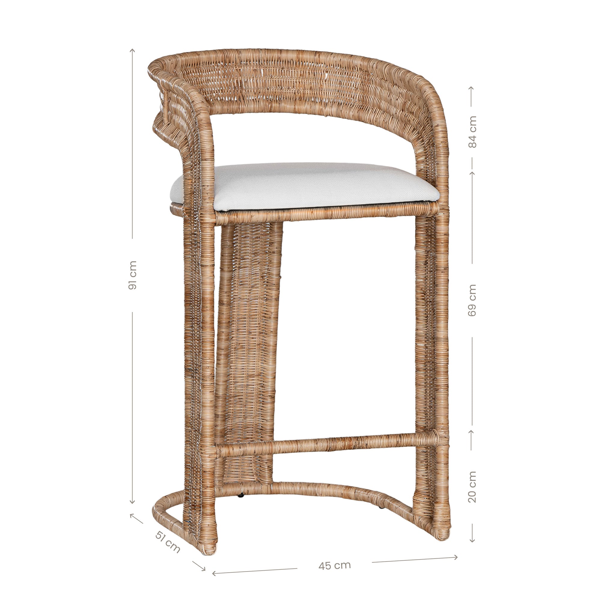 A natural rattan bar stool with a curved backrest and a white upholstered cushion. The woven texture and sturdy frame bring a relaxed yet sophisticated coastal-inspired aesthetic to any bar or kitchen counter