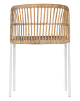 Modern rattan dining chair with a white metal frame, featuring a curved backrest and woven natural rattan for a stylish and airy aesthetic