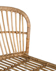 Modern rattan dining chair with a white metal frame, featuring a curved backrest and woven natural rattan for a stylish and airy aesthetic