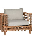 Handcrafted rattan one seater sofa featuring an intricate open-weave frame with plush natural cushions, combining natural texture with contemporary comfort for indoor or covered outdoor spaces